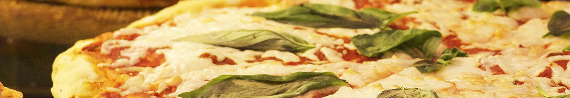 Eating Italian Pizza at Alessio's Restaurant & Pizzeria restaurant in Cumming, GA.